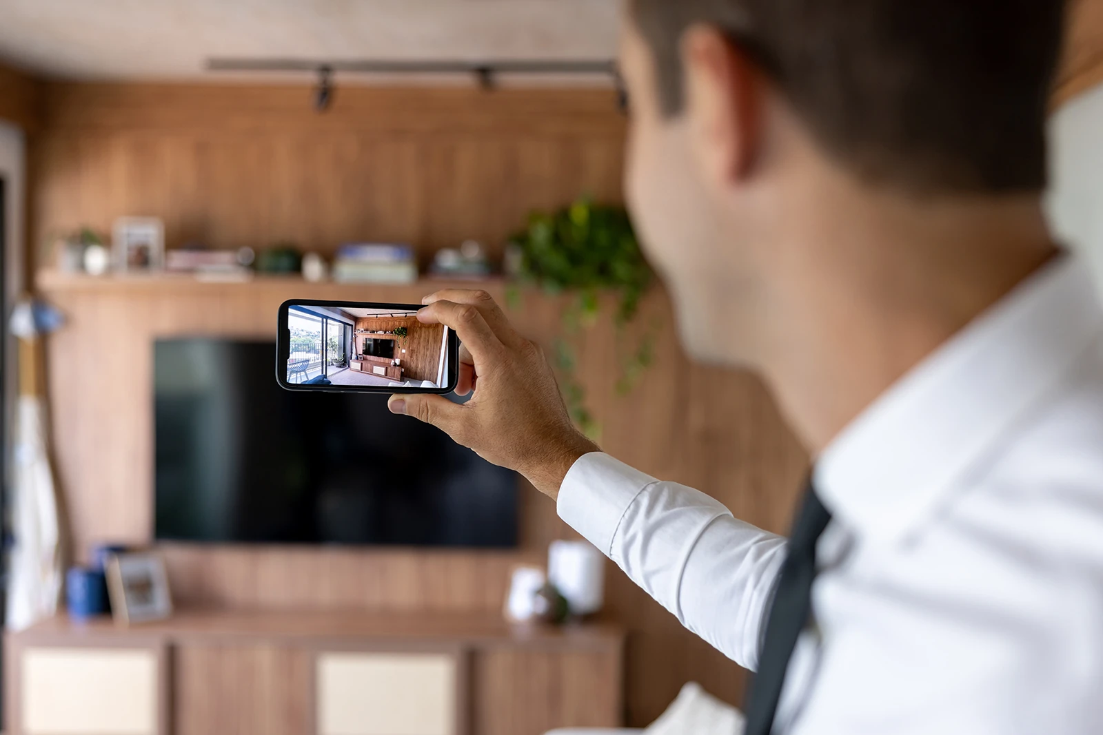 Close-up of a home video survey being carried out using a mobile phone.