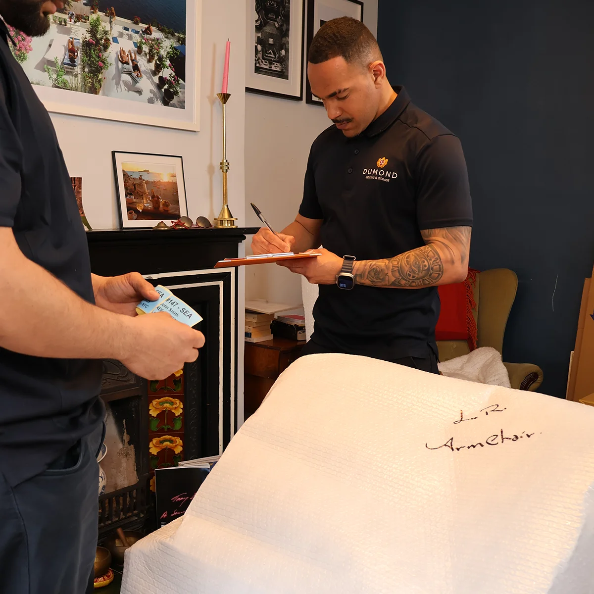 Dumond employee preparing survey notes for a bespoke home relocation.